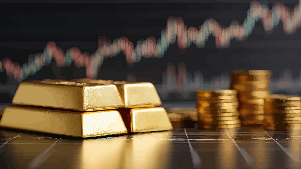 Gold bars and coins with market chart in background